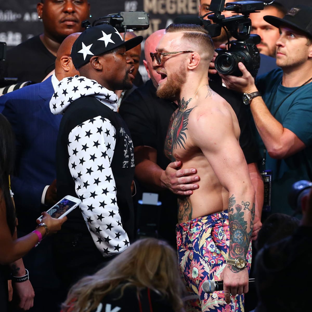 Floyd Mayweather and Conor McGregor run out of insults as press