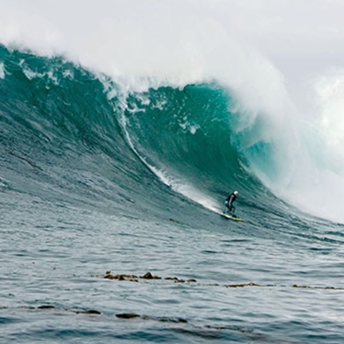 Surfers take on 'mountain' of a wave, The Right, fuelled by huge