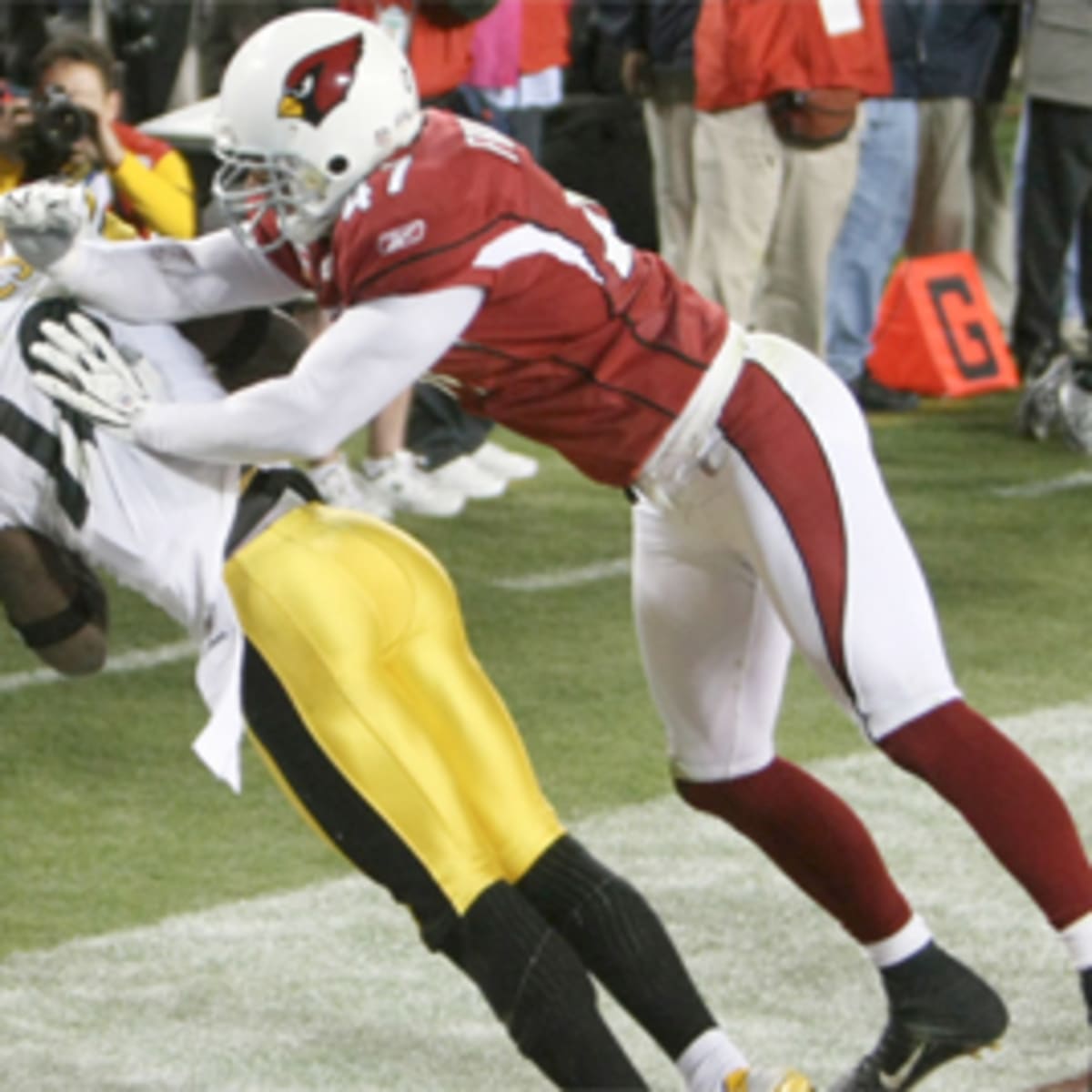 Pittsburgh Steelers linebacker James Harrison takes in some oxygen