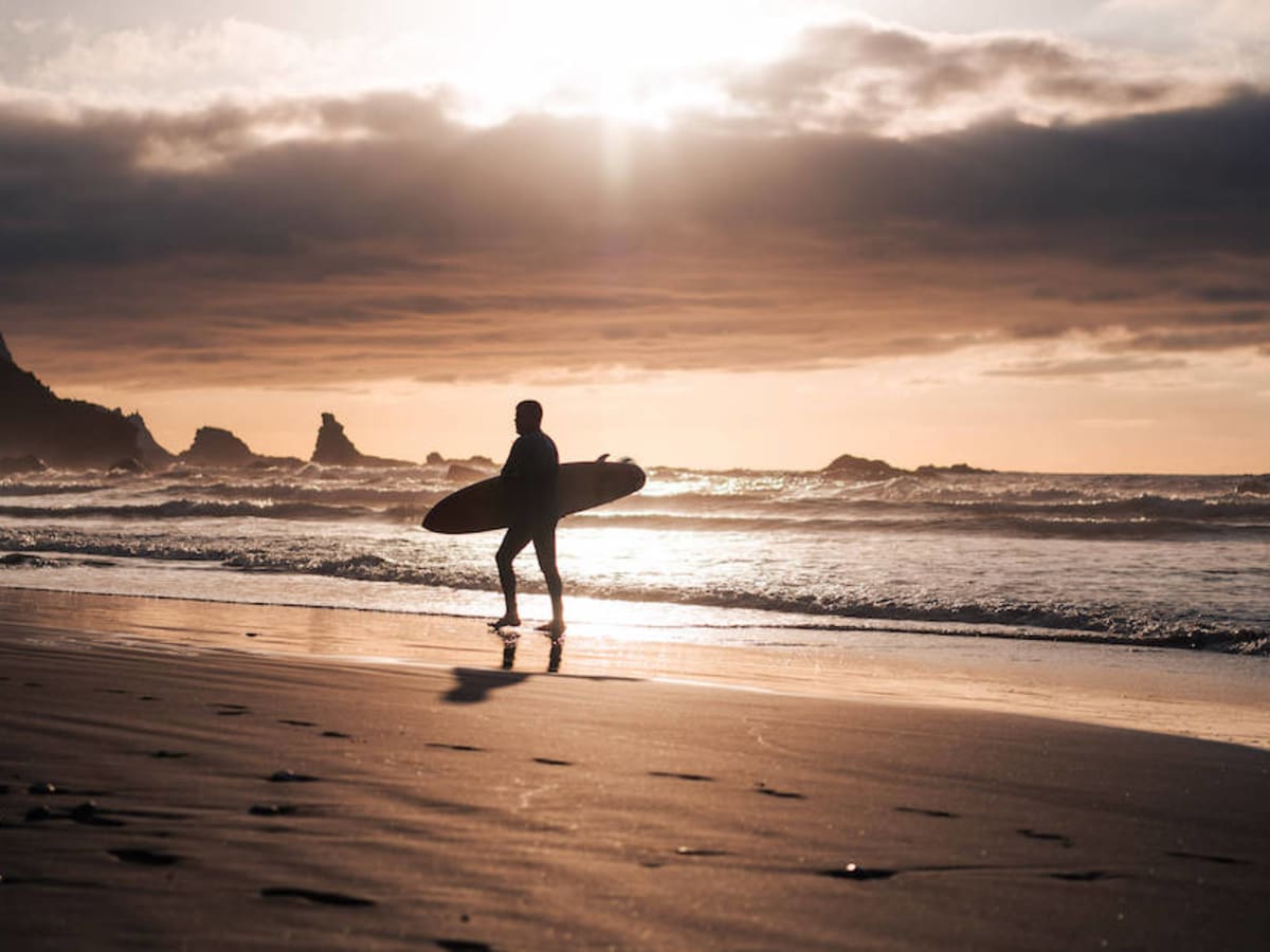 Mikala Jones, Hawaii surfer known for making videos inside waves, dies in  surfing accident