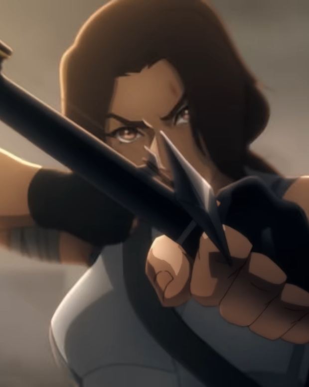 Lara Croft aiming a bow in Tomb Raider: The Legend of Lara Croft
