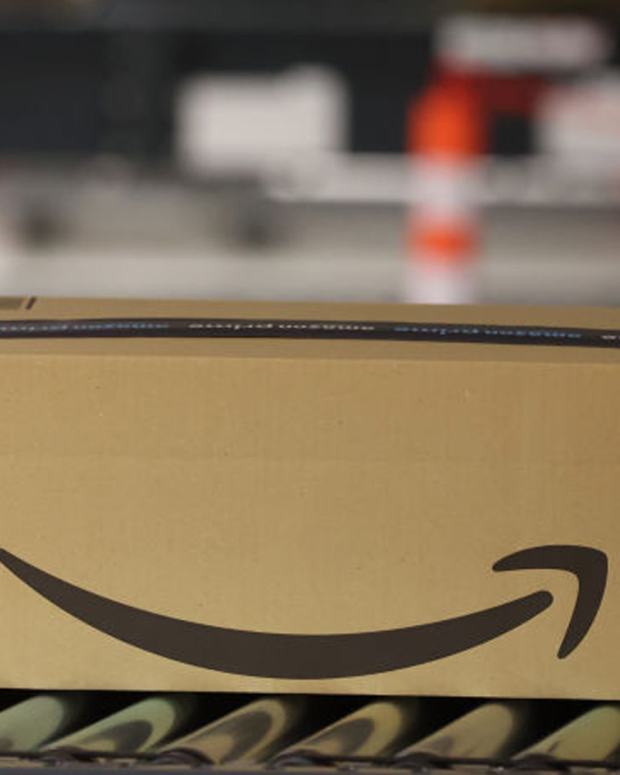 SUTTON COLDFIELD, ENGLAND - Amazon parcels are prepared for delivery at Amazon's Robotic Fulfillment Centre
