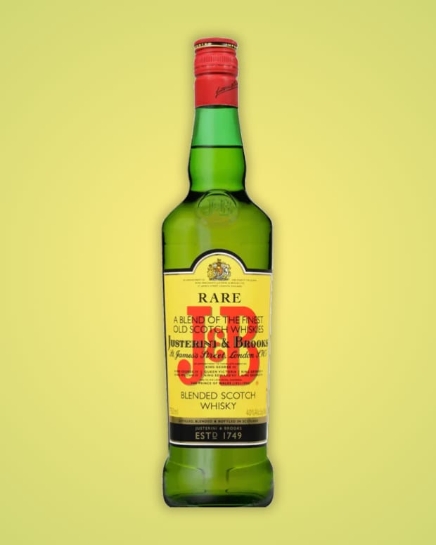 J&B Blended Scotch on a green background