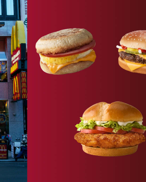 McDonald's at Times Square with various McDonald's items on dark red gradient background.