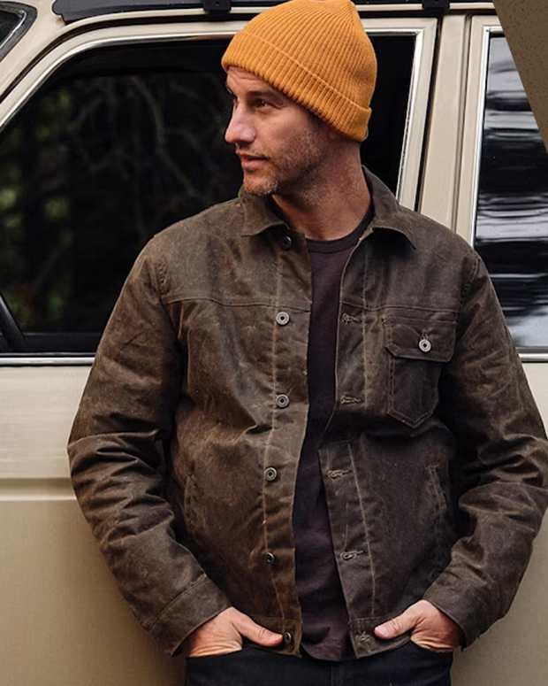 The Flint and Tinder Wool-Lined Waxed Trucker Jacket, seen here in Forest, is now on sale at Huckberry.