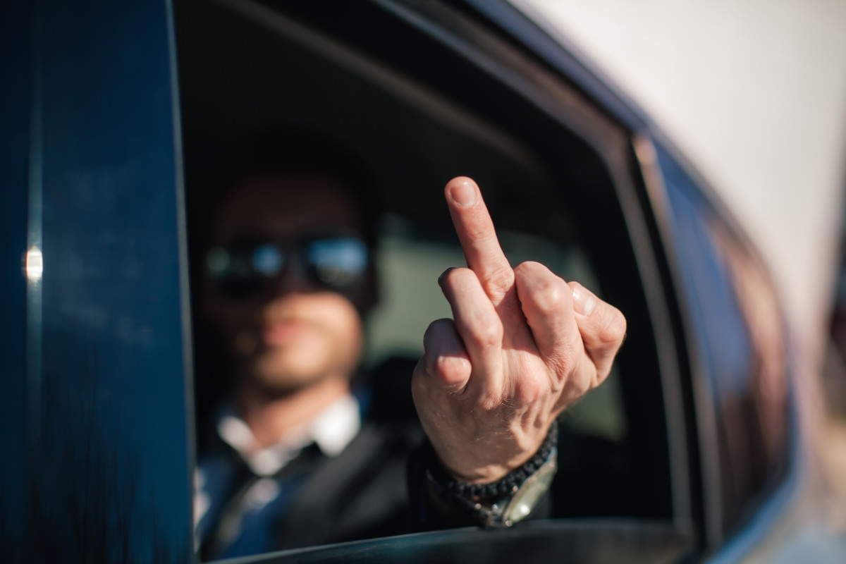 Driver Arrested for Flipping Off Cop Gets Major Payday