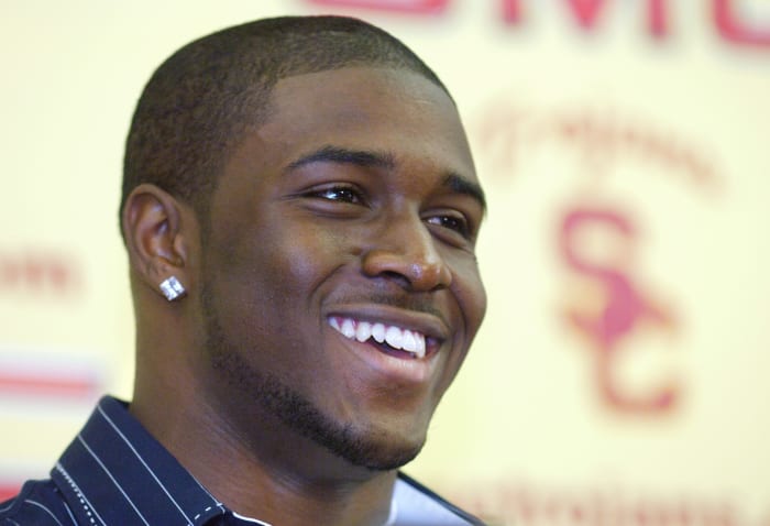 Reggie Bush Files Lawsuit To Get His Heisman Trophy Back - Men's Journal