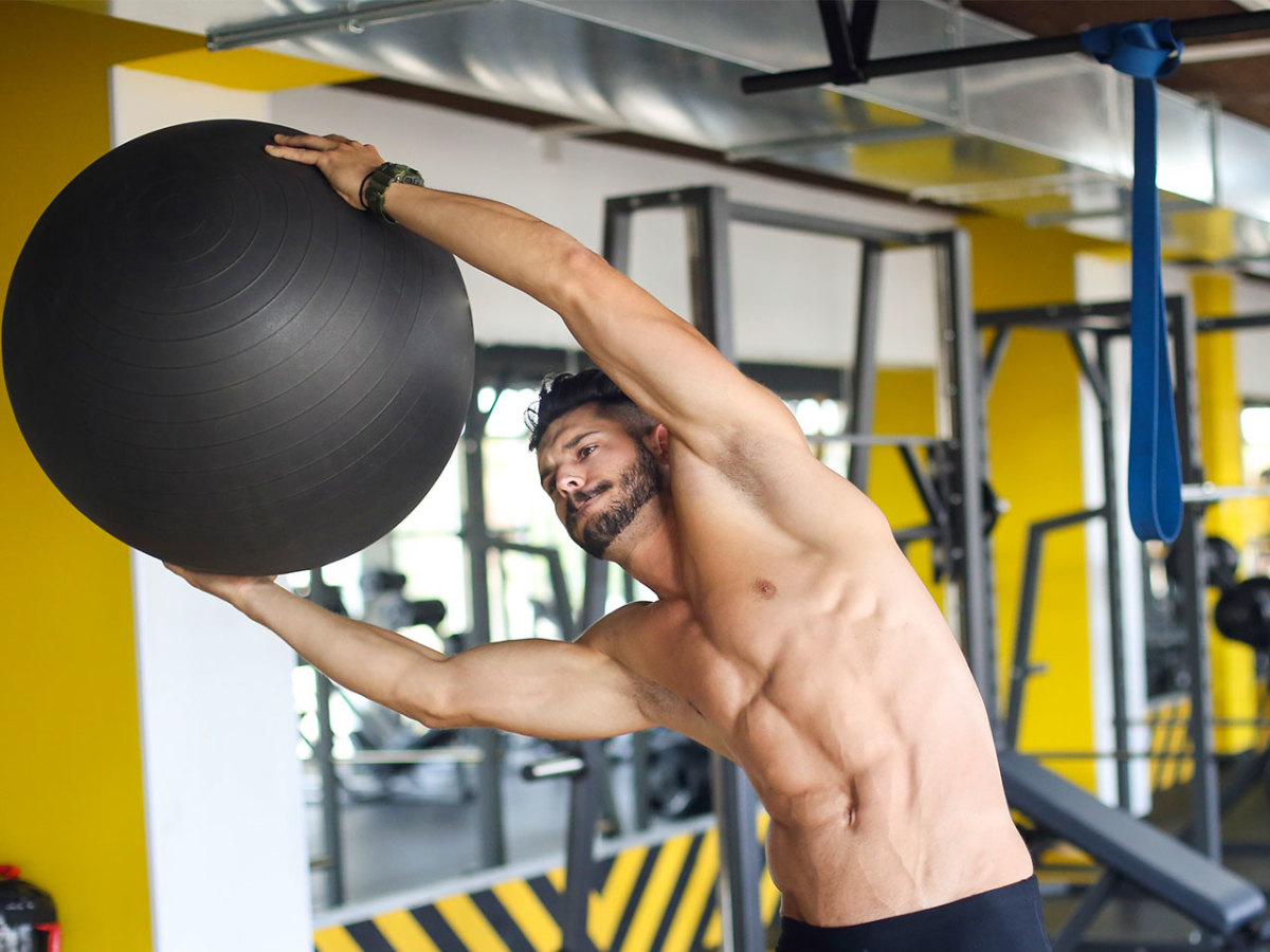 20 Swiss Ball Exercises That Will Sculpt Your Abs - Men's Journal
