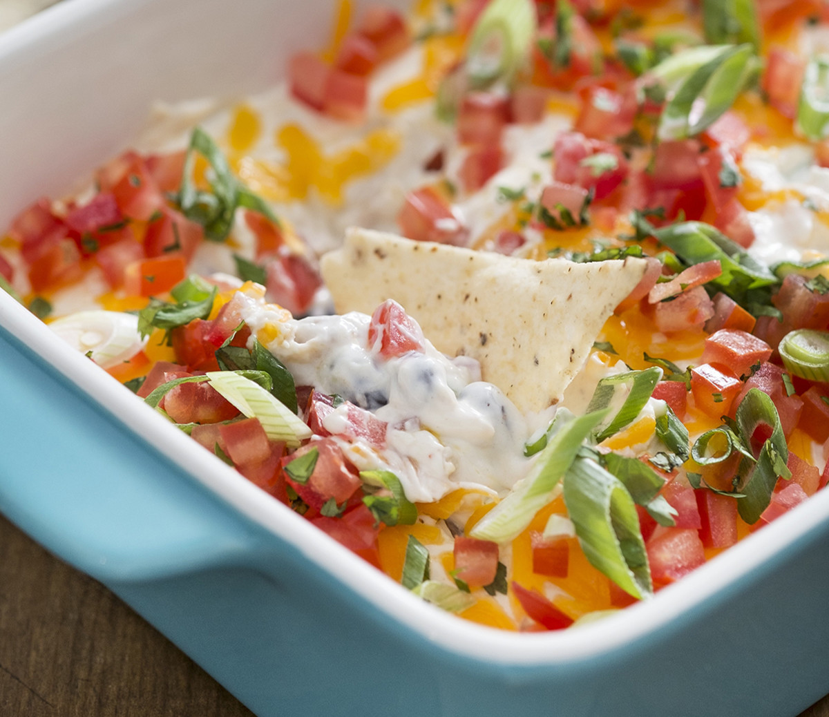 https://www.mensjournal.com/.image/t_share/MTk2MTM1ODEzNDQ1NzIzNjUz/27-recipe-chicken-nacho-dip.jpg