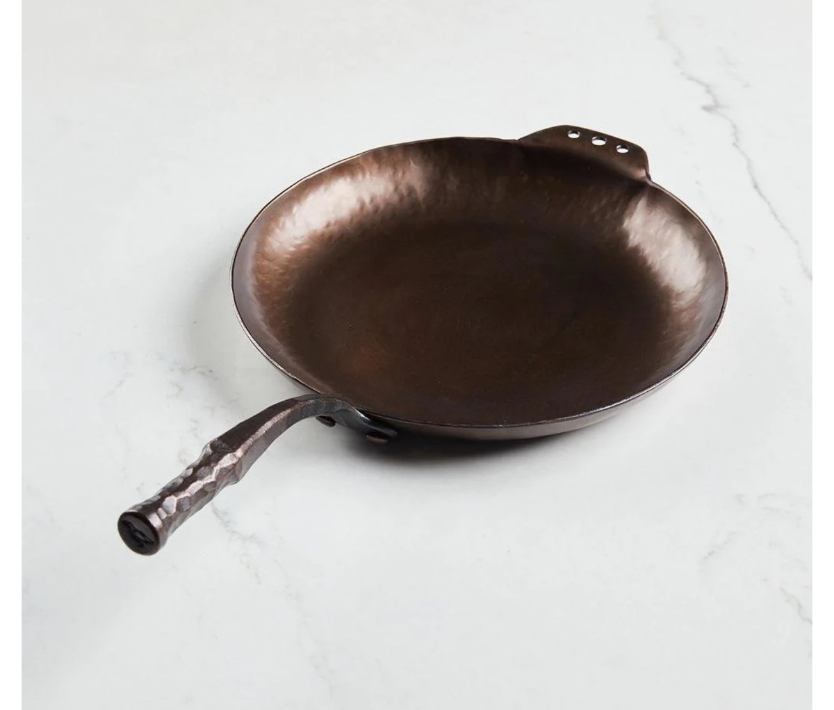 https://www.mensjournal.com/.image/t_share/MTk2MTM2NTA2ODE2MjEwMDY1/14-smithey-carbon-steel-farmhouse-skillet.jpg