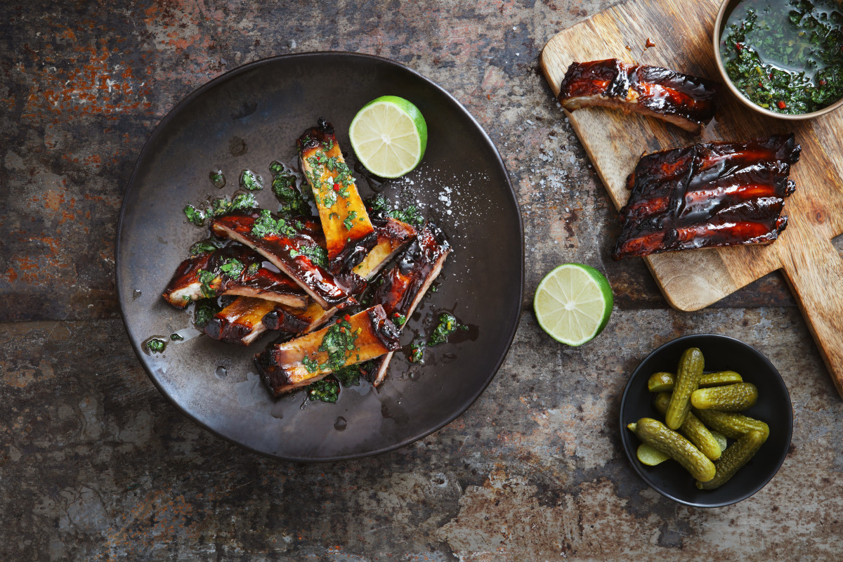 Pomegranate and red wine glazed pork ribs with chimichurri sauce