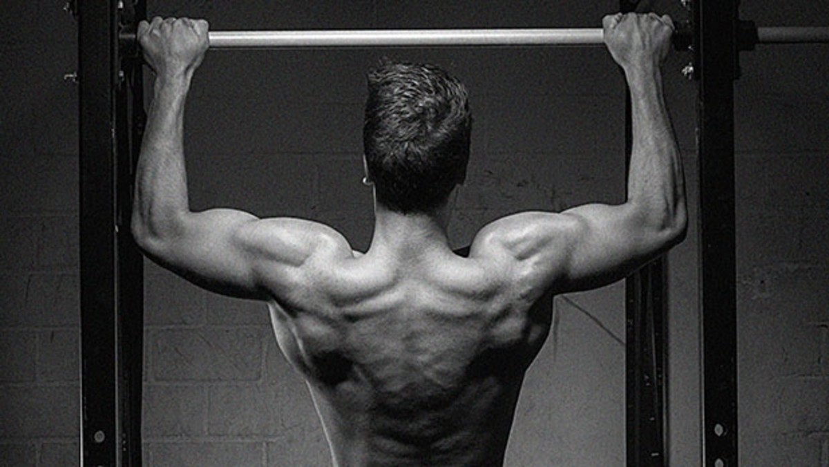 Mixed-grip pull-up exercise instructions and video