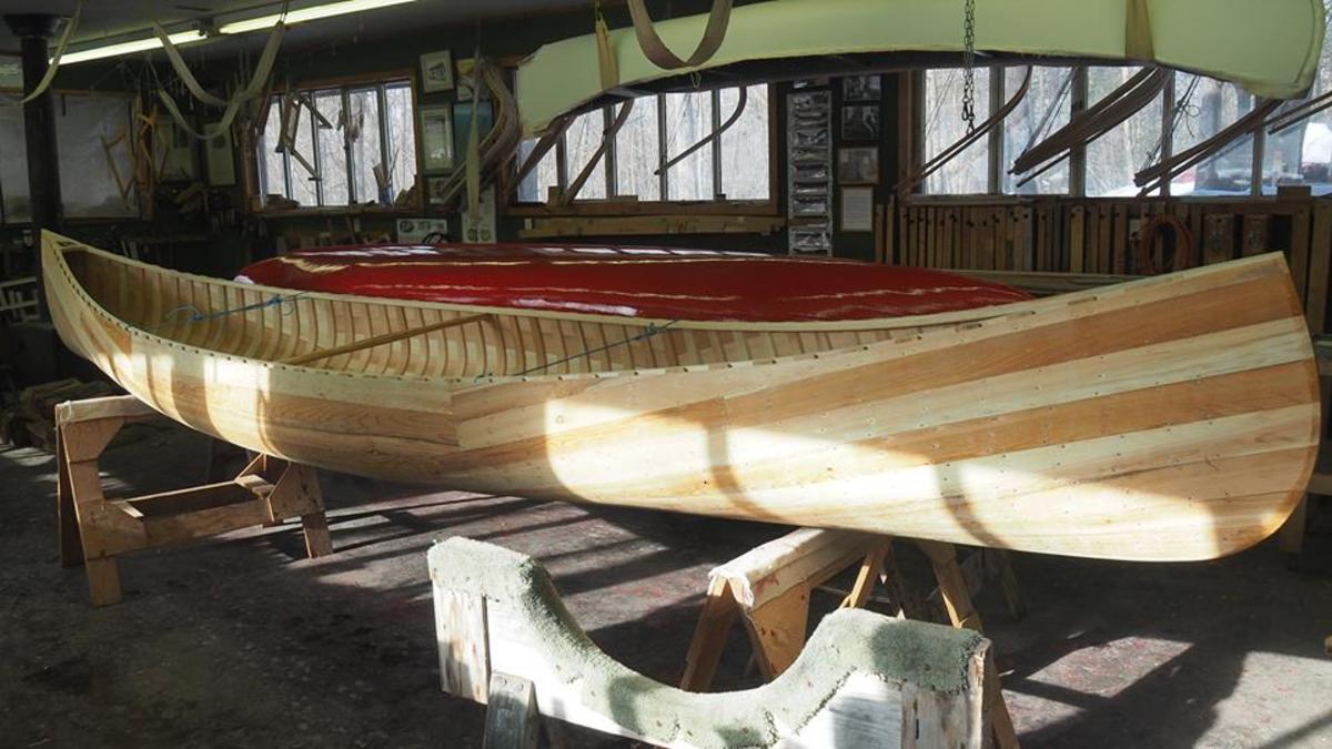 Blue Canoe 1920's Chestnut Wood and Canvas Canoe