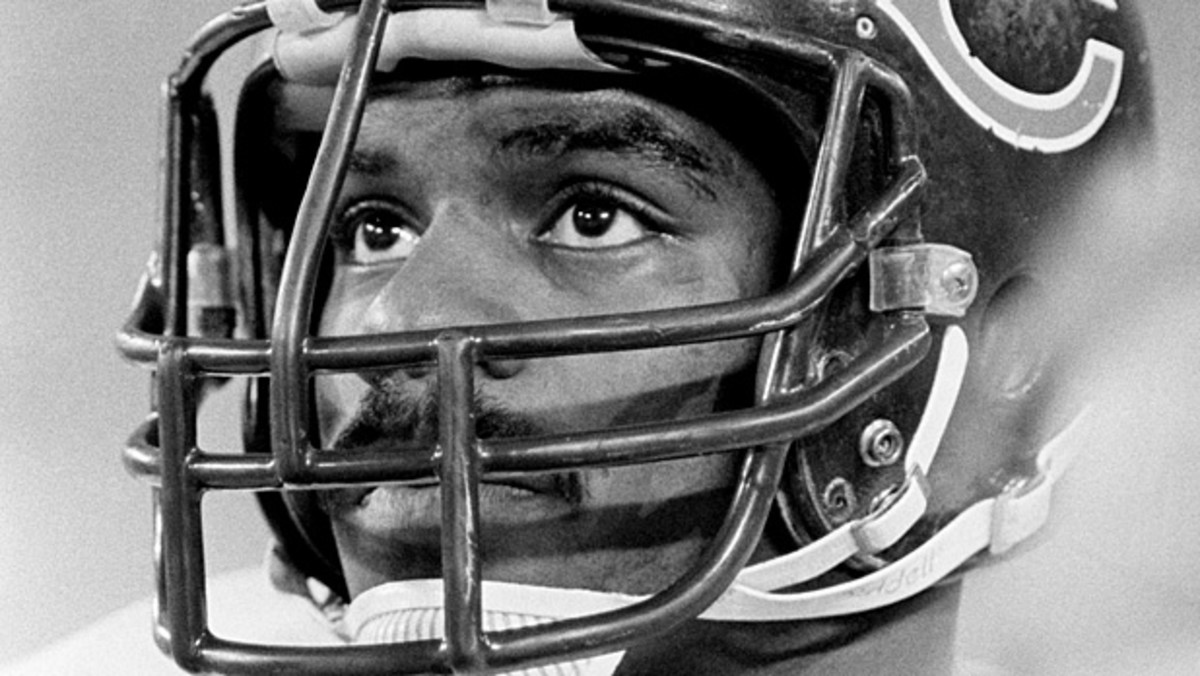 A detail view of a Chicago Bears helmet is seen resting on a