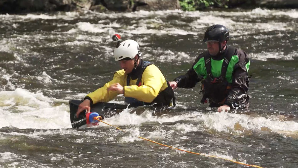 How to unwrap a canoe pinned on a mid-river obstacle - Men's Journal