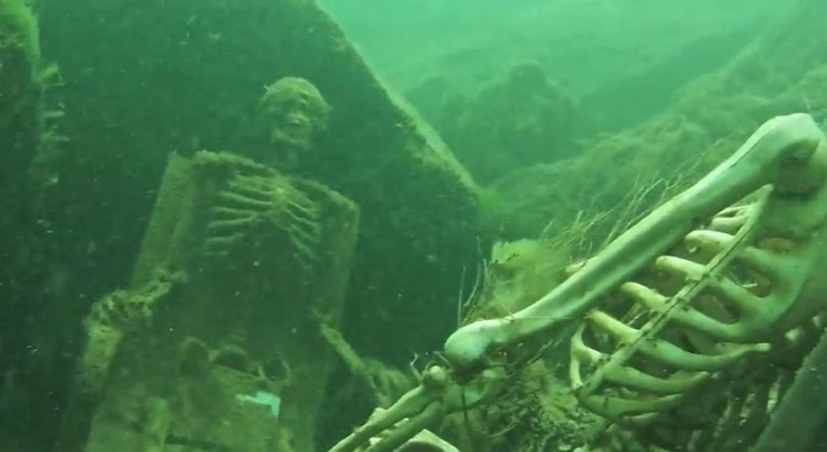 Skeletons found in underwater tea party deemed fake - Men's Journal