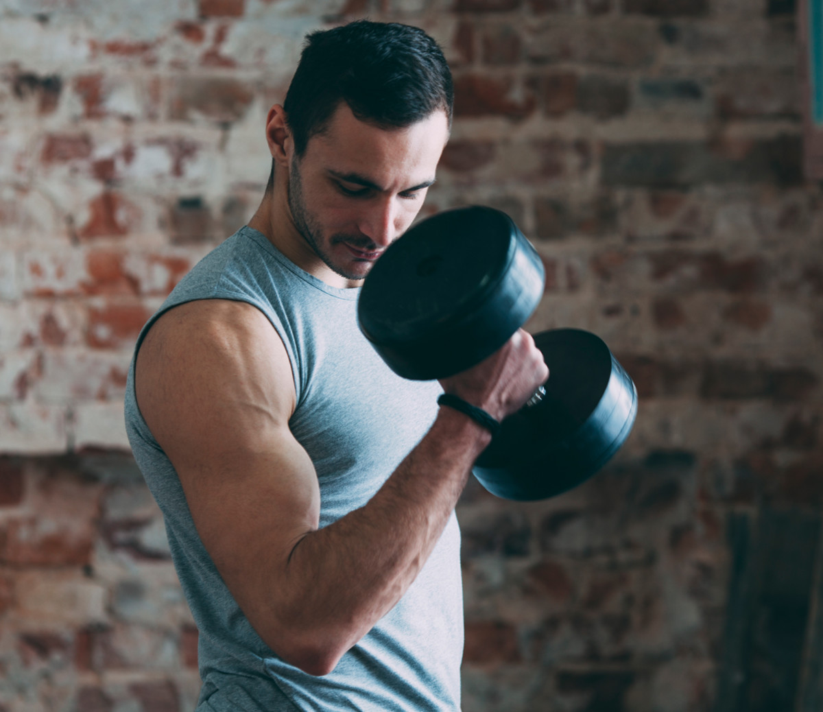 If You Want to Get Stronger, You Should Start Lifting Less - Men's Journal