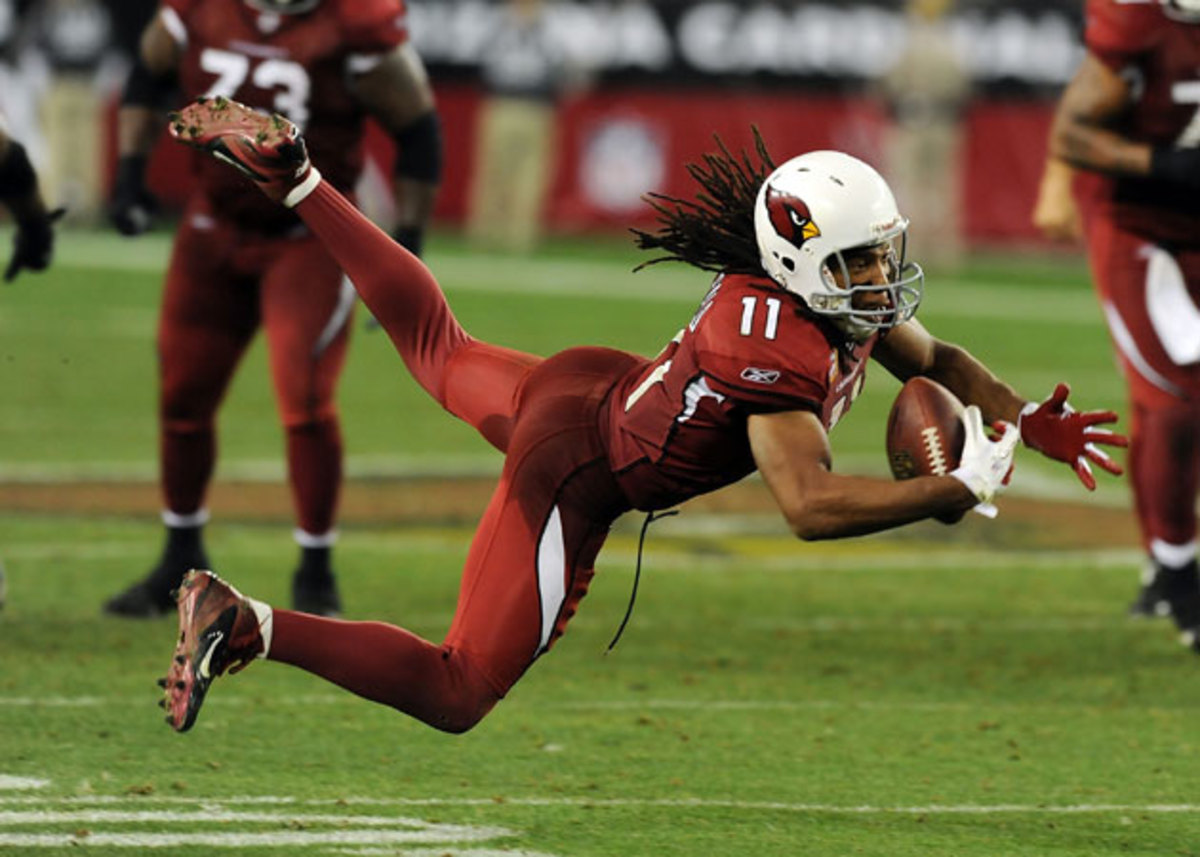 Arizona Cardinals wide receiver Larry Fitzgerald outruns