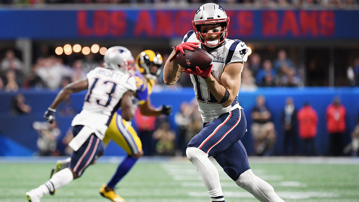 New England Patriots MVP Julian Edelman (L) and quarterback Tom Brady  celebrate winning Super Bowl LIII at Mercedes-Benz Stadium in Atlanta on  February 3, 2019. New England wins its sixth Super Bowl