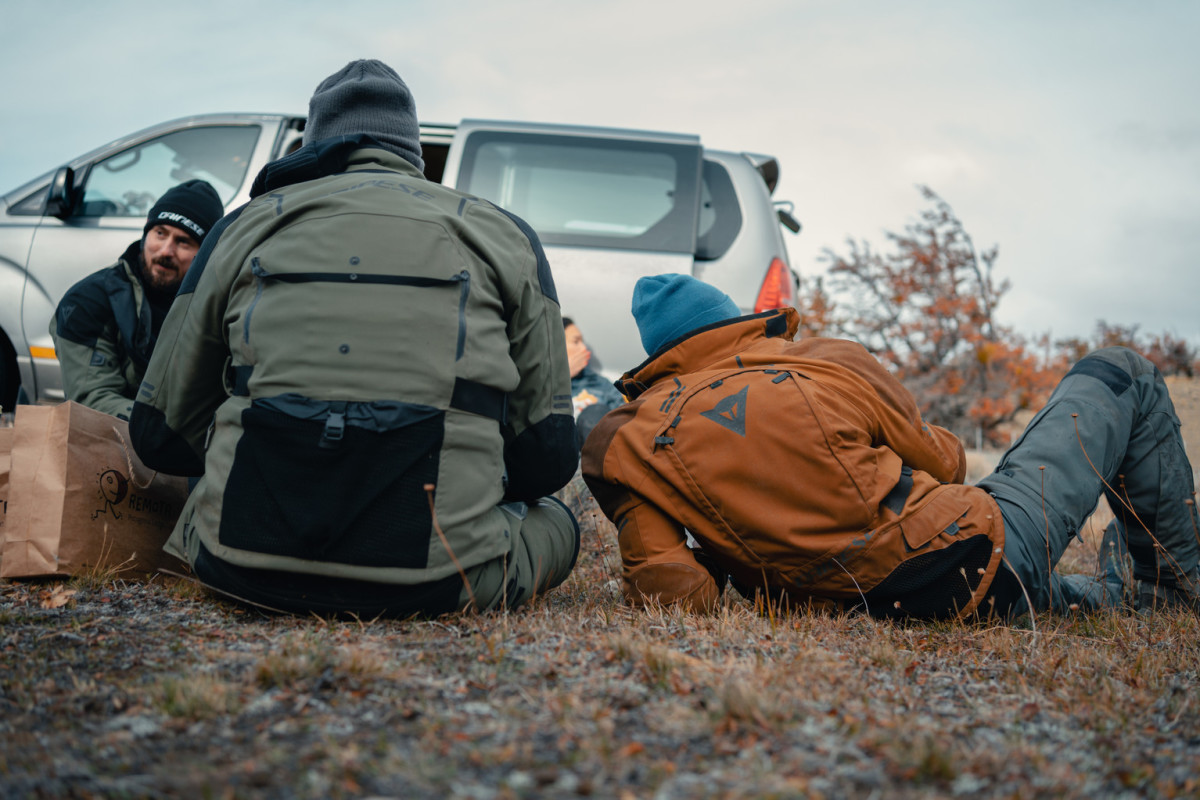 Motorcyclists take a break on the Dainese Expedition Masters tour