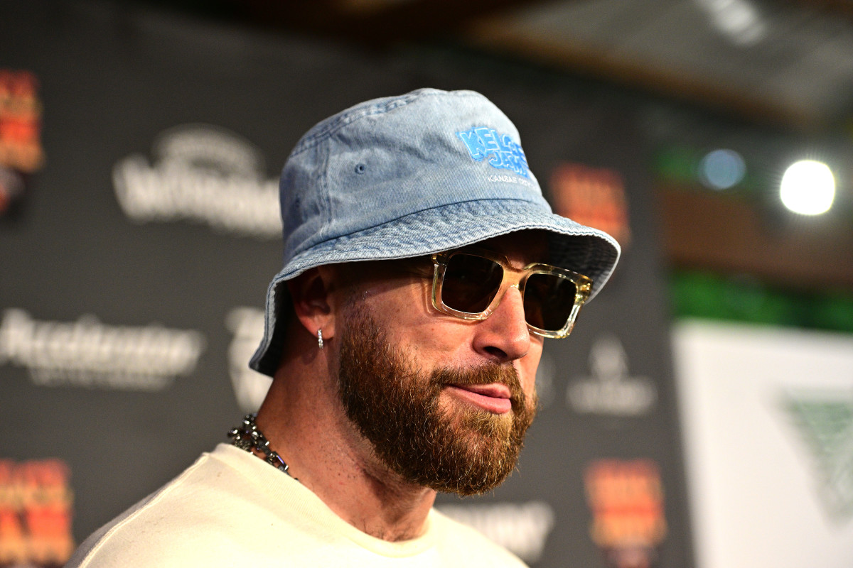 KANSAS CITY, KANSAS - MAY 18: Travis Kelce answers questions from the press on the red carpet during Kelce Jam 2024 at Azura Amphitheater on May 18, 2024 in Bonner Springs, Kansas. (Photo by Fernando Leon/Getty Images for Raising Cane's)