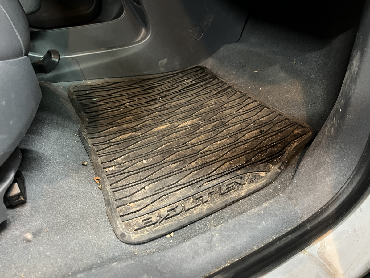 https://www.mensjournal.com/.image/t_share/MjAzNTM4NTUyNzcwNzk5NDEy/op_emily-fazio_how-to-clean-car-floor-mats_dirty-rubber-car-mat.jpg