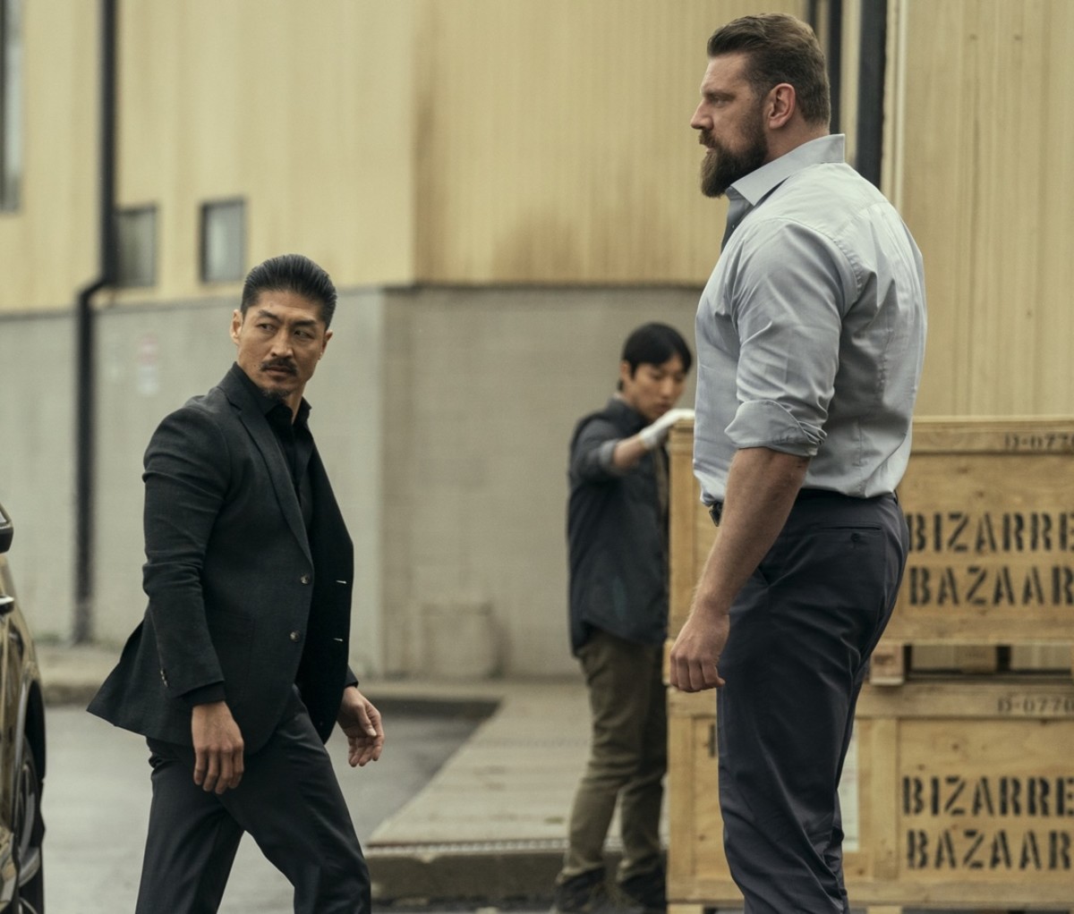 Brian Tee as Quinn and Olivier Richters as Paulie in 'Reacher' Season 3.