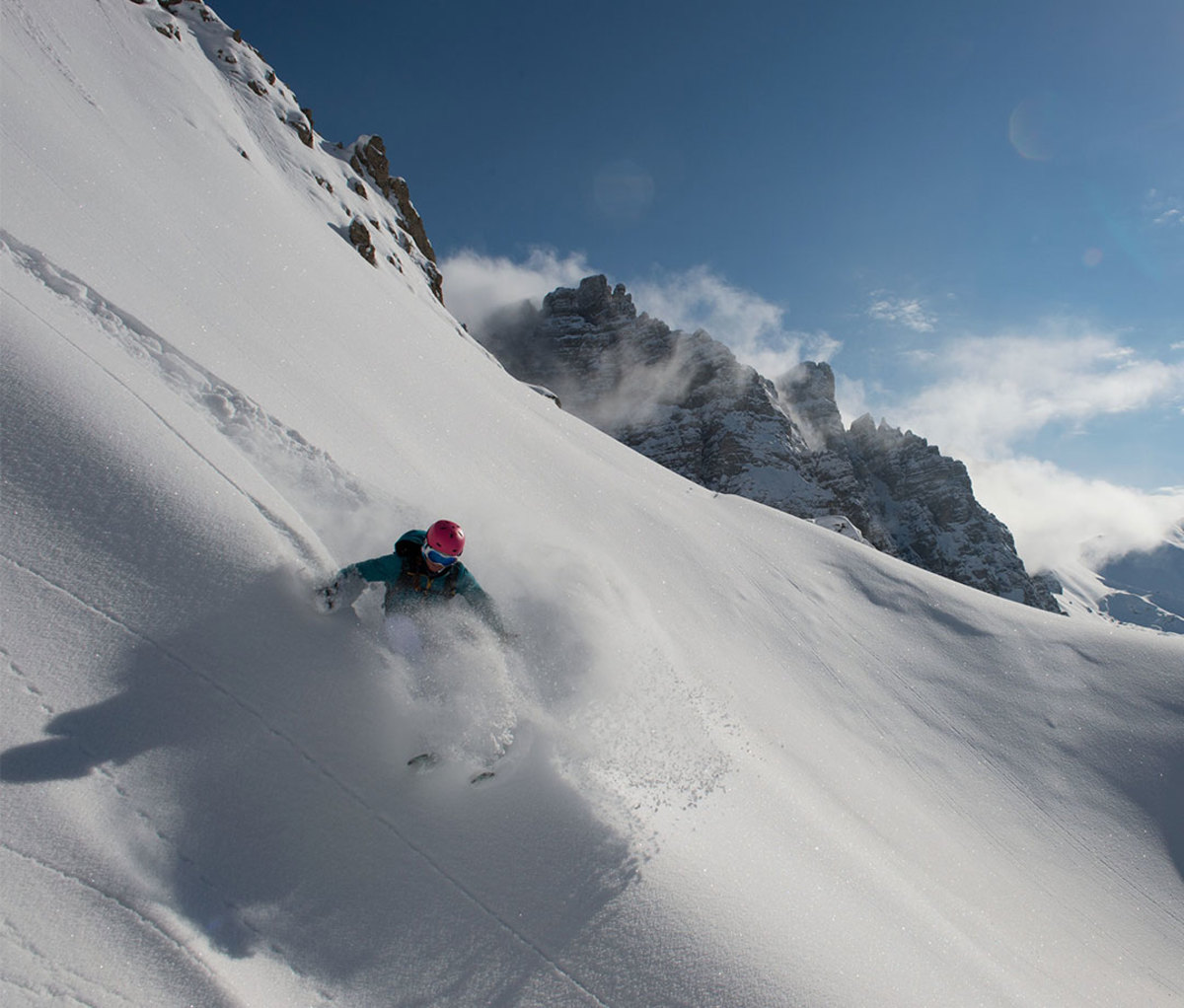 Axamer Lizum Ski Resort in Tirol with jagged Kalkkögel mountains in background.