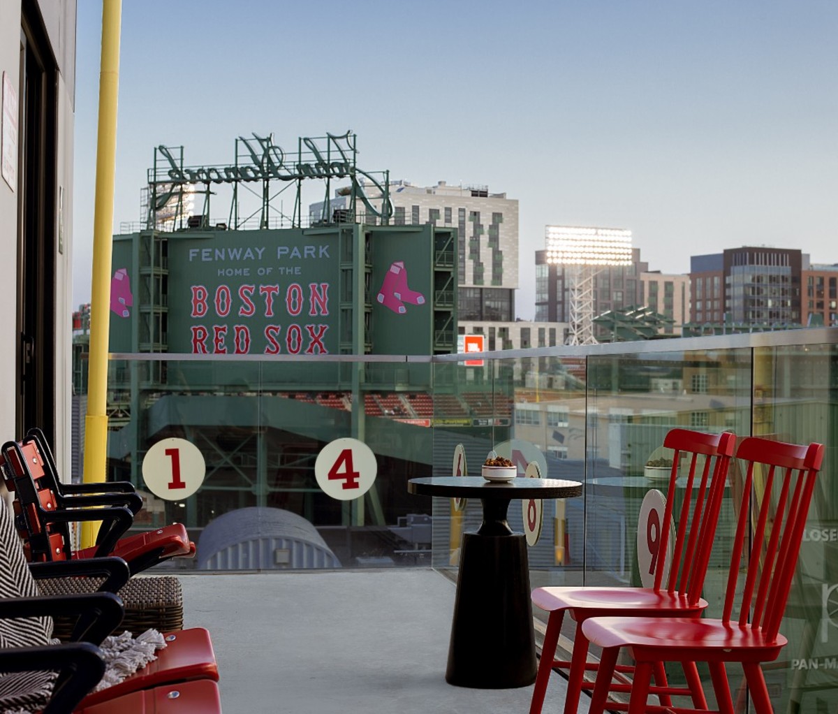 Hotel balcony overlooking Fenway Park baseball stadium