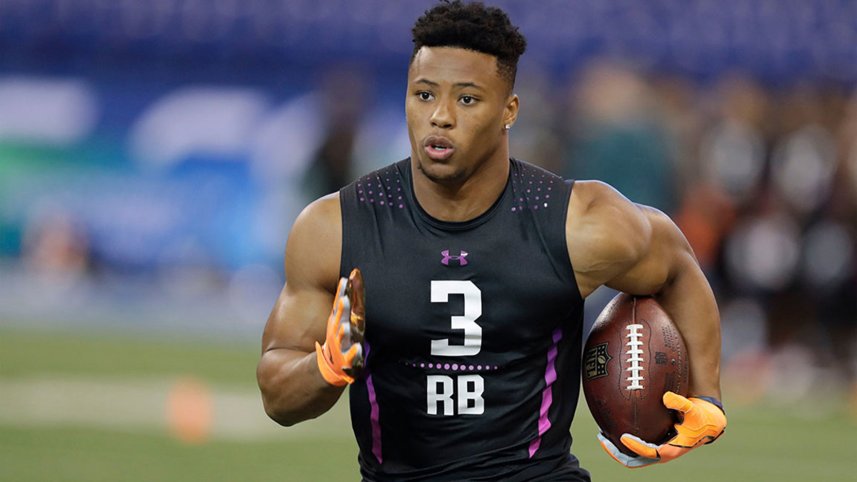 NFL Combine Football, Indianapolis, USA - 02 Mar 2018 Penn State running back Saquon Barkley runs a drill during the NFL football scouting combine, in Indianapolis