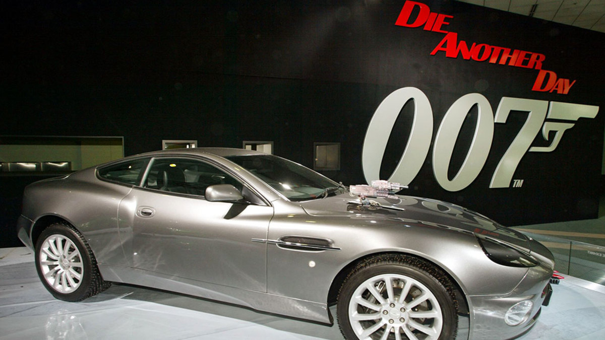 LA AUTO SHOW, LOS ANGELES, USA ASTON MARTIN VANQUISH A gadget-loaded Aston Martin V12 Vanquish is displayed, at the Greater Los Angeles Auto Show at the Los Angeles Convention Center, as part of a display of Aston Martin models featured in James Bond movies. A modified version of the V12 Vanquish was used in the most recent James Bond movie, "Die Another Day." The auto show runs through Sunday 9 Jan 2003