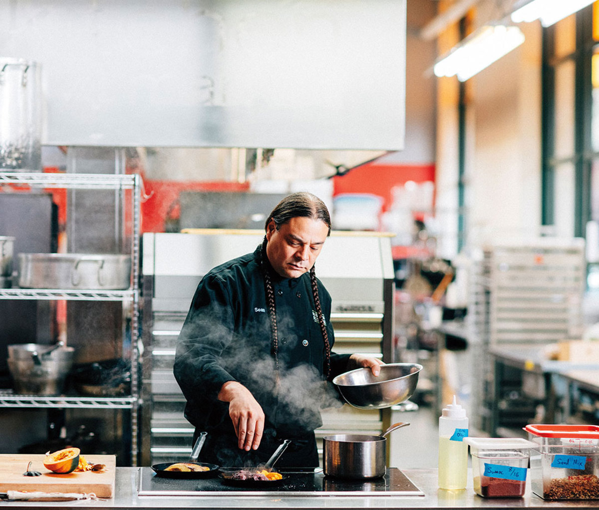 Sean Sherman, cooking at the Indigenous Food Lab in Midtown Global Market, plans to open a new downtown restaurant, Owamni by The Sioux Chef this spring.