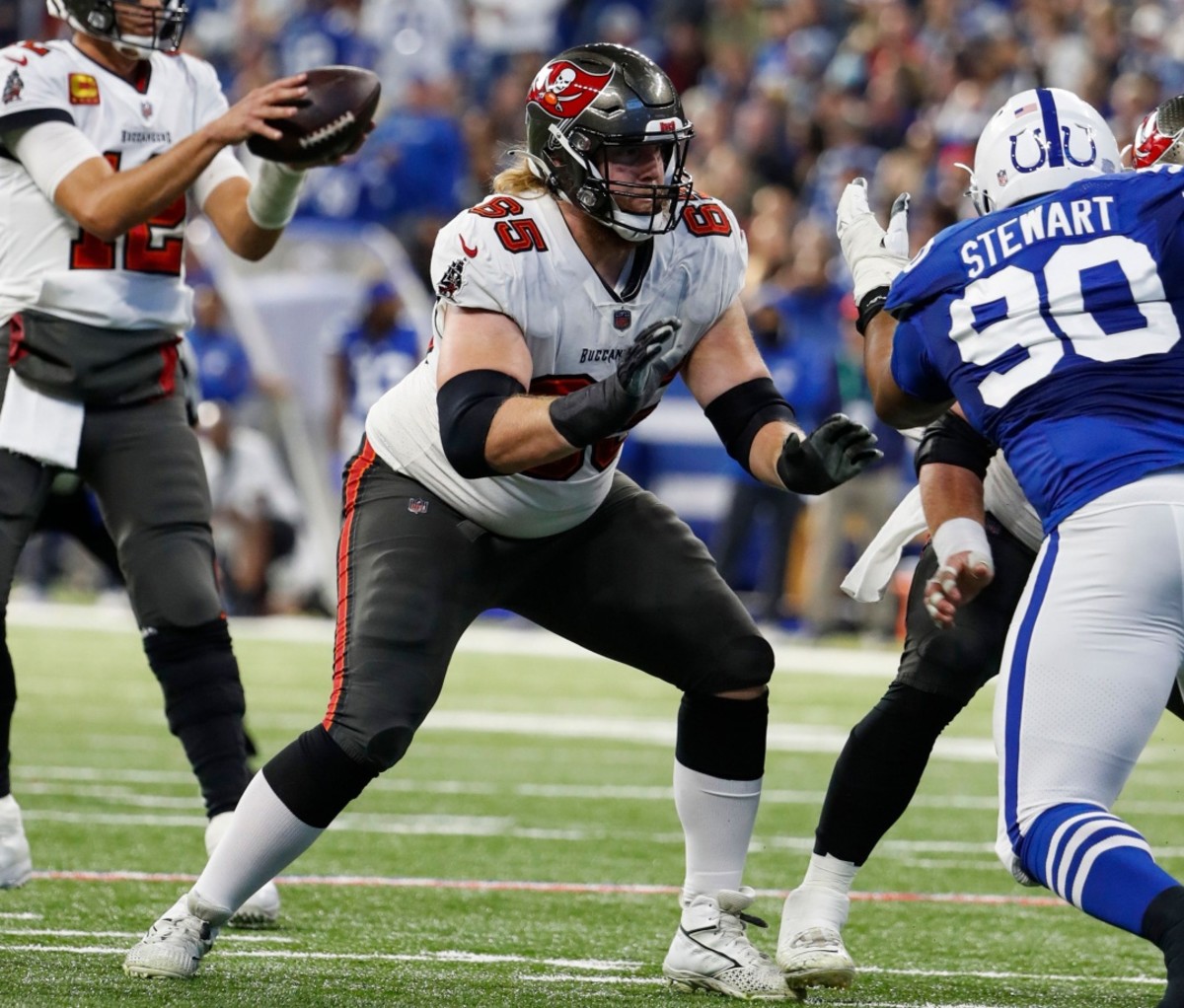 Alex Kappa blocking an opposing player at the line of scrimmage