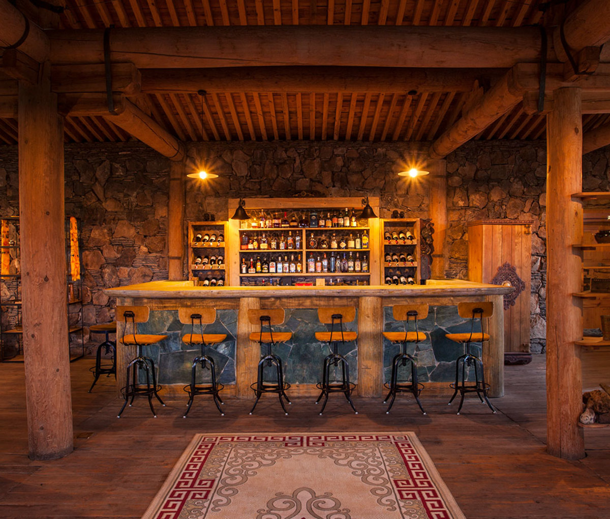 Interior of stone-and-wood bar called The Thirsty Camel in Mongolia