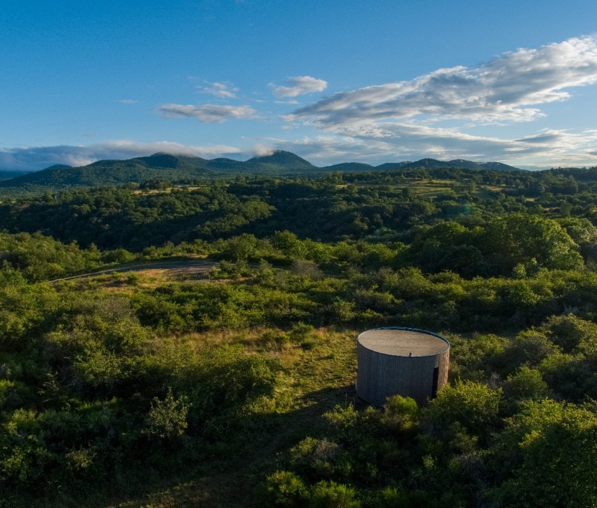 Airbnb and Volvic's unique LUMIPOD vacation rental looking out toward France's Chaîne des Puys volcano range.