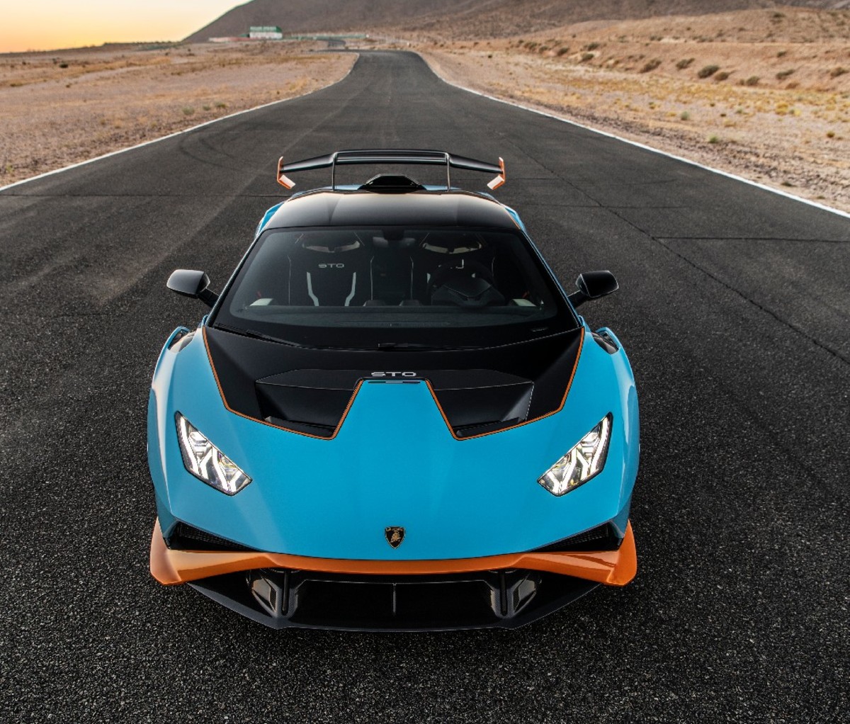 Front angle of blue 2021 Lamborghini Huracán STO on a race track