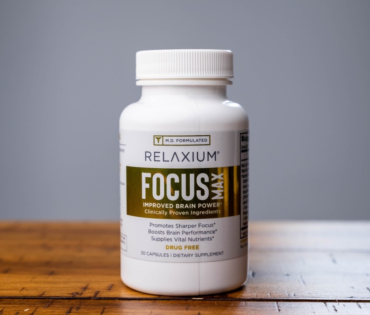 Relaxium focus supplement bottle with gold label