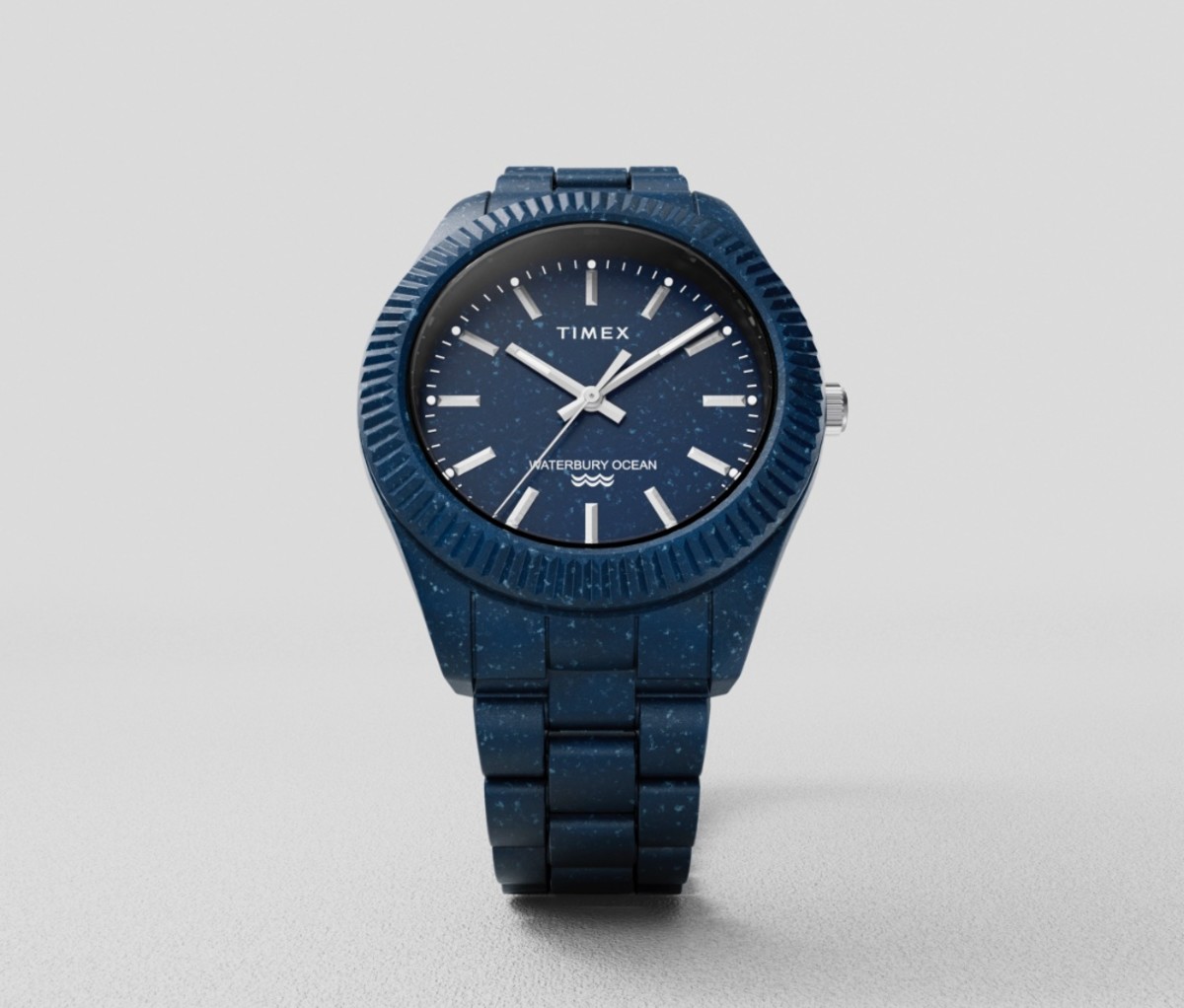 Blue Timex Waterbury Ocean watch on a grey background