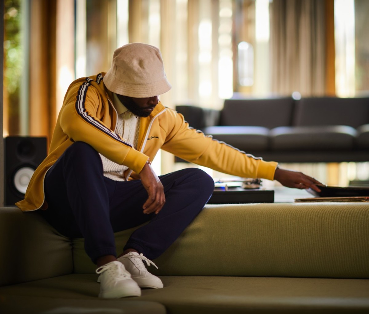 Tinie wears Signature zip-through track top from Ben Sherman.