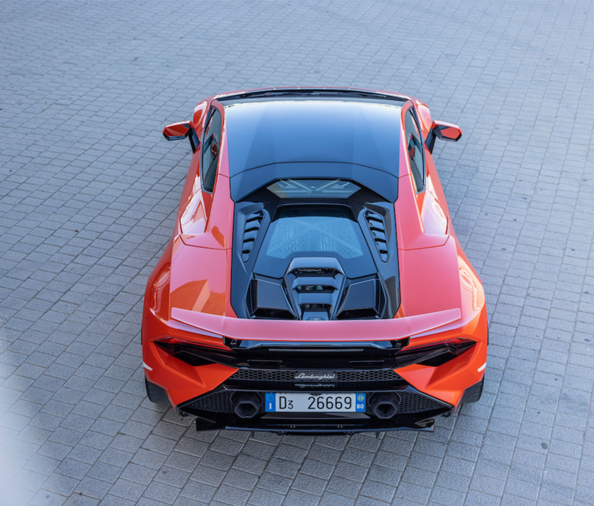 Red sports car viewed from back end