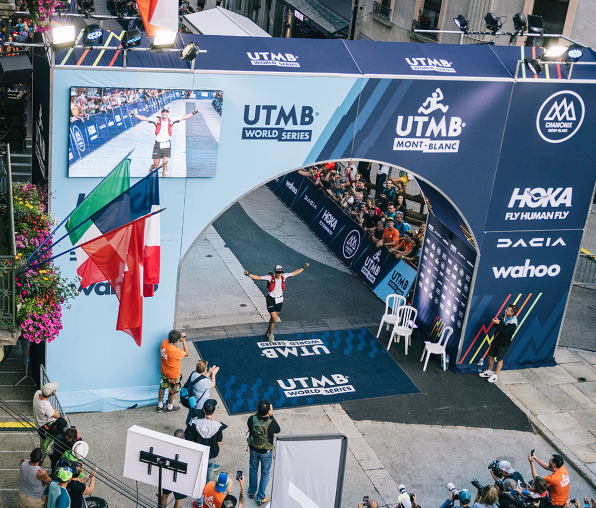 Runner crosses finish line of UTMB