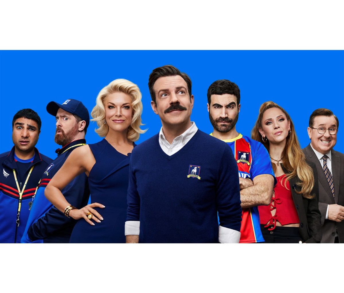 TV show cast of men and women against blue backdrop