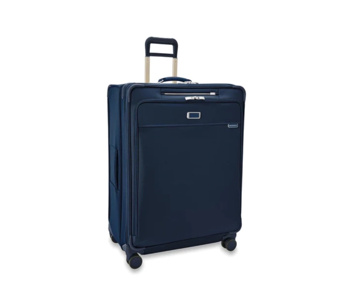 Blue wheeled luggage on a white background.