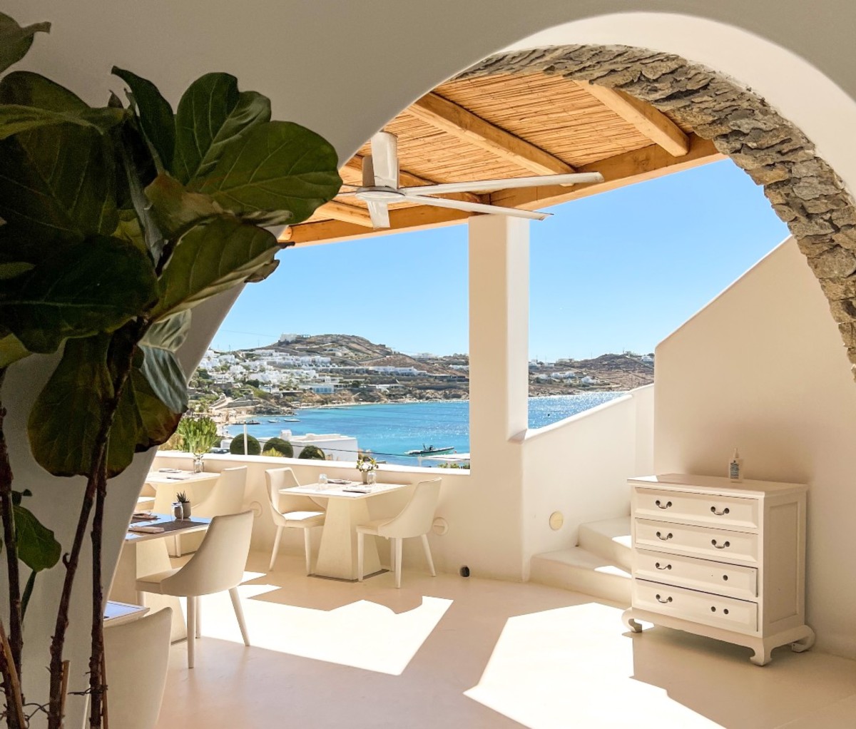 White-washed hotel dining area in daytime