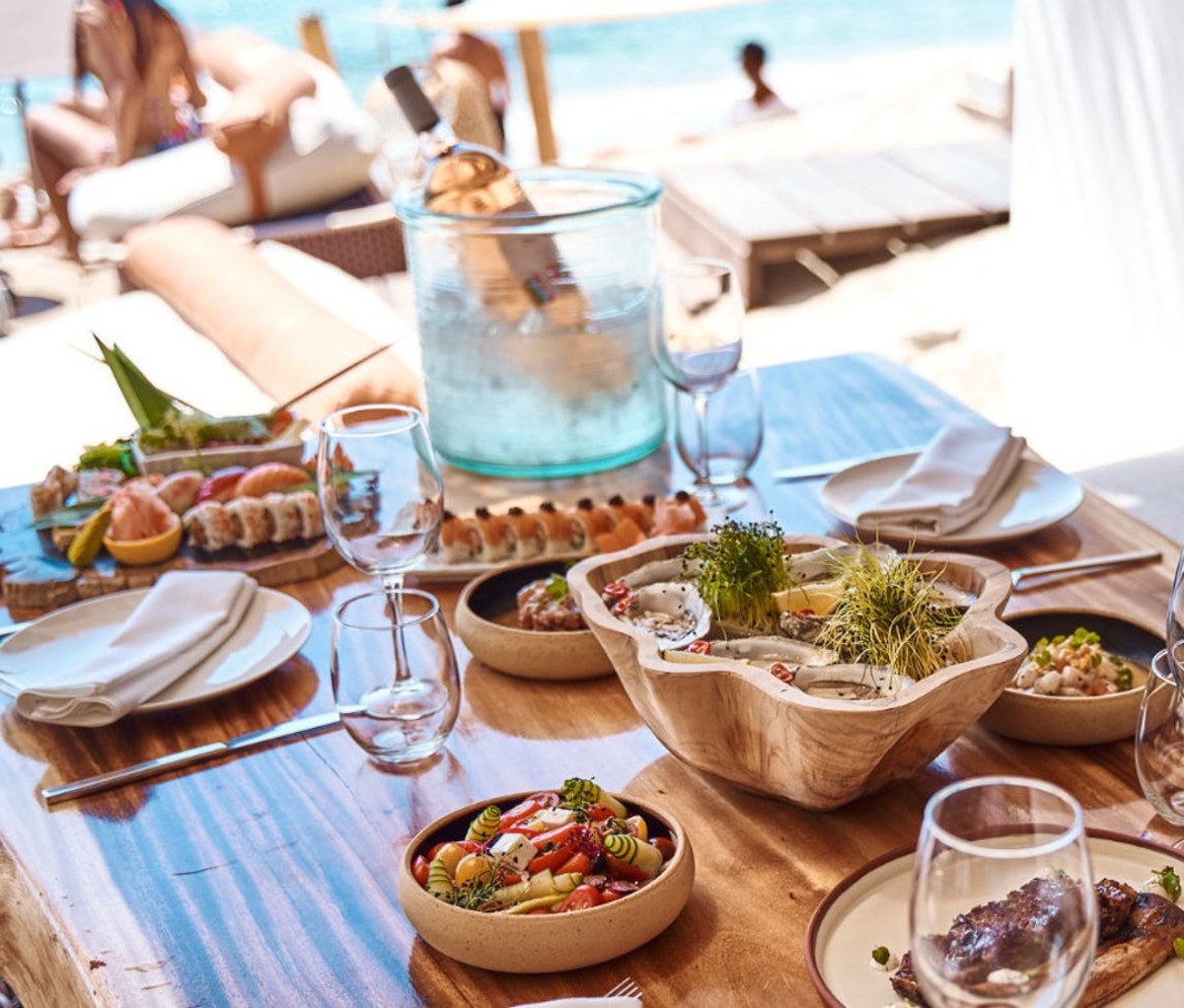 Fresh seafood spread on table by beach