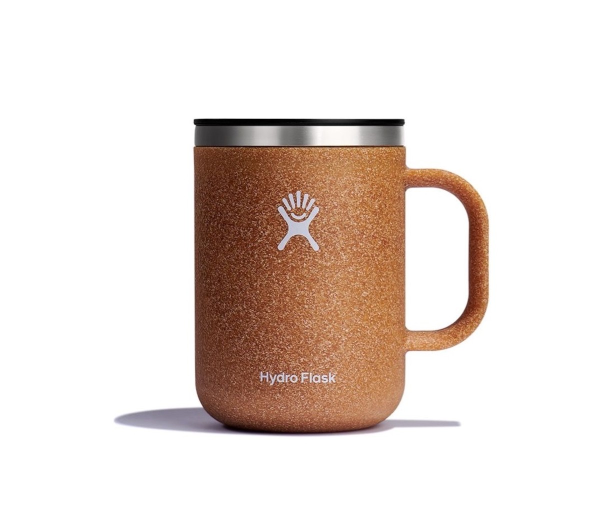 Large brown speckled mug on a white background.