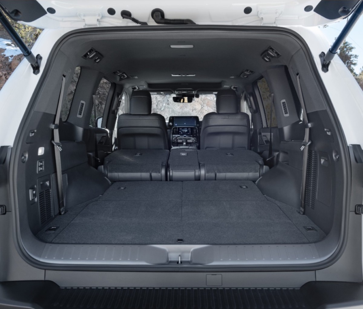 Rear cargo space of a luxury SUV.