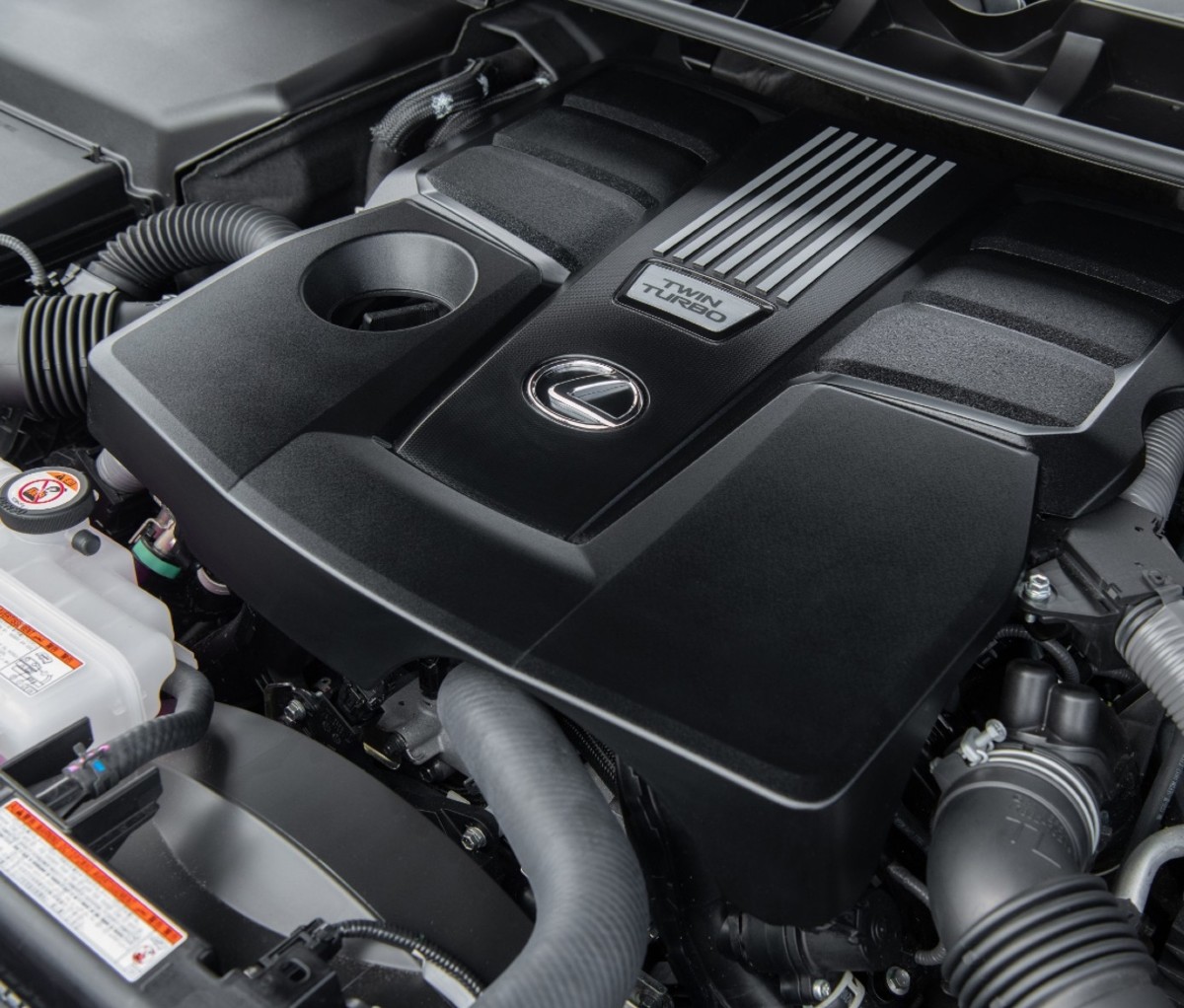 Engine bay of a luxury SUV.