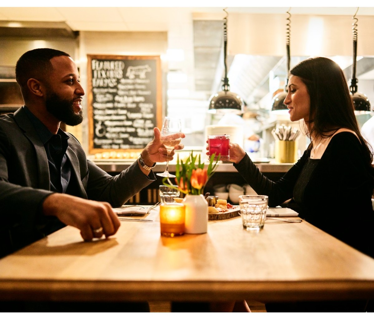 A couple have drinks at The Lake House on Canandaigua's Rose Tavern